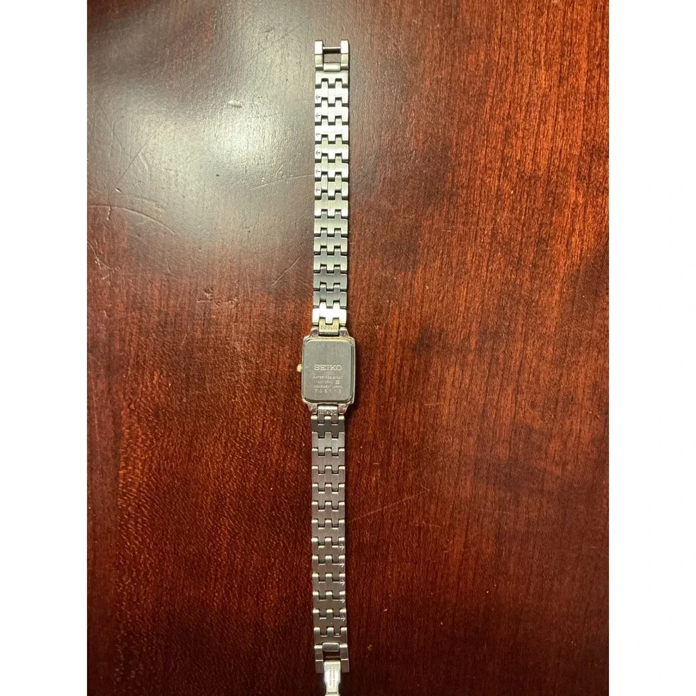 Seiko Womens Two Tone Tank Watch 1N01-0FH0 Silver Gold Rectangular White Dial